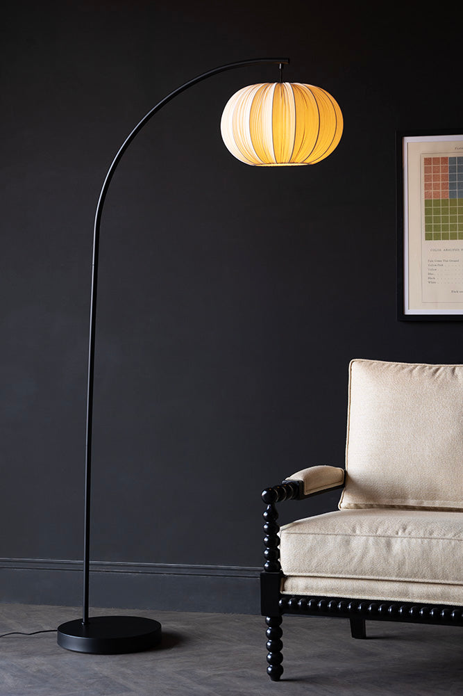 Black Arch Floor Lamp with Neutral Pleated Fabric Lampshade