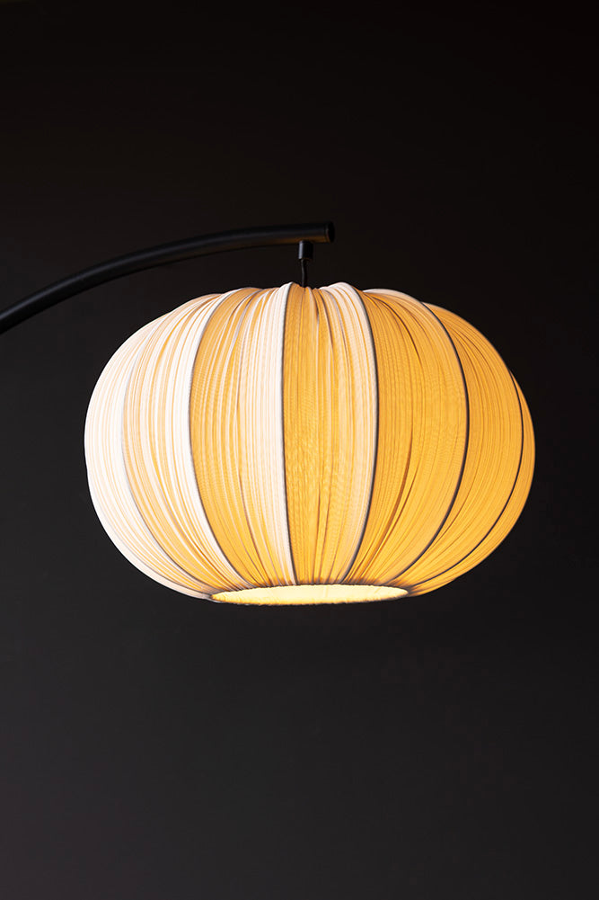 Black Arch Floor Lamp with Neutral Pleated Fabric Lampshade