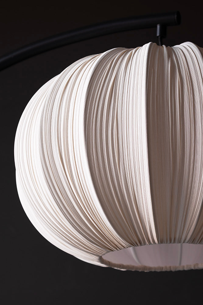Black Arch Floor Lamp with Neutral Pleated Fabric Lampshade