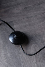 Black Arch Floor Lamp with Neutral Pleated Fabric Lampshade