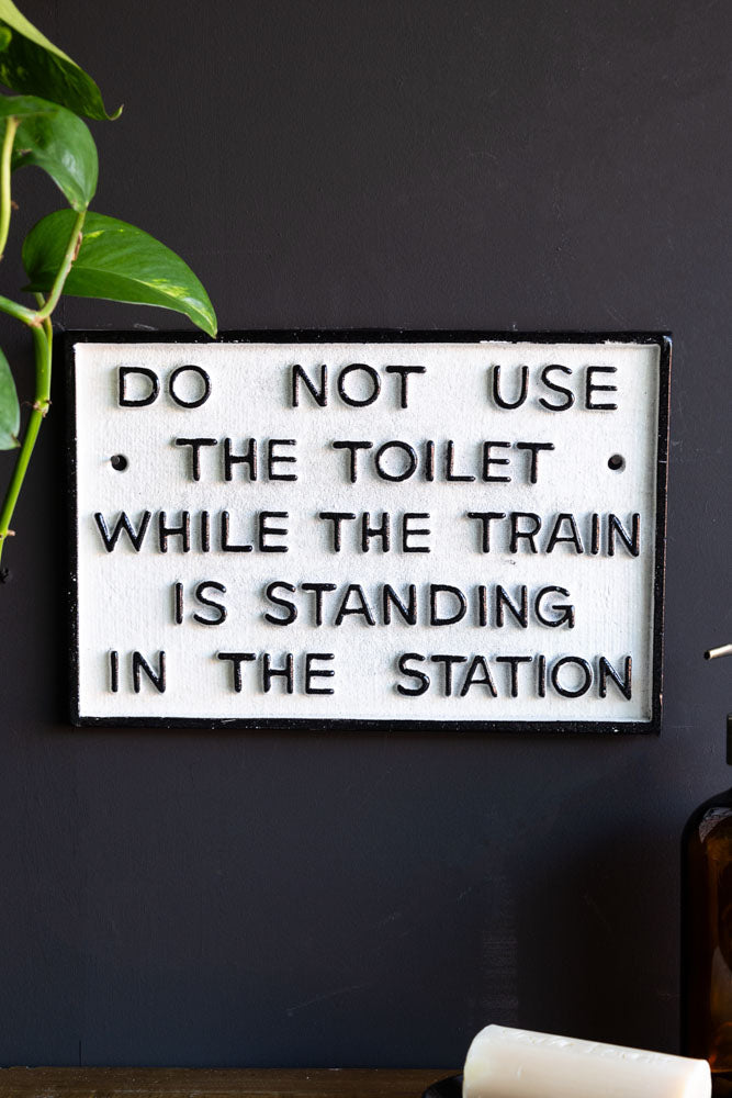 Do Not Use The Toilet When The Train... Hanging Sign