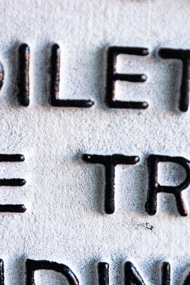 Do Not Use The Toilet When The Train... Hanging Sign