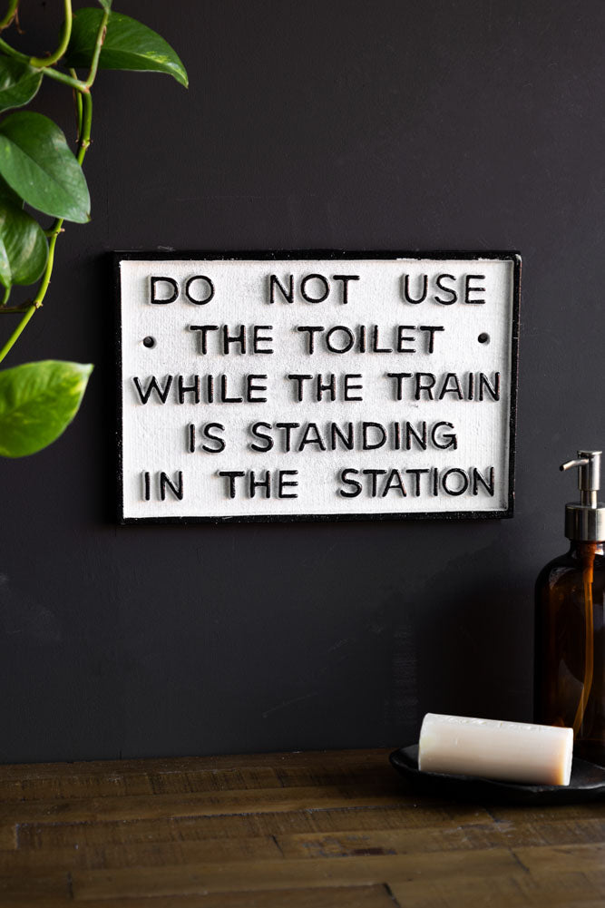 Do Not Use The Toilet When The Train... Hanging Sign