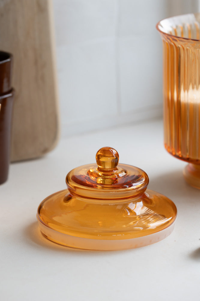 Elegant Ribbed Glass Storage Jar in Amber