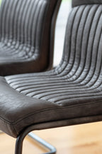 Ribbed Antique-Style Black Leather Chair