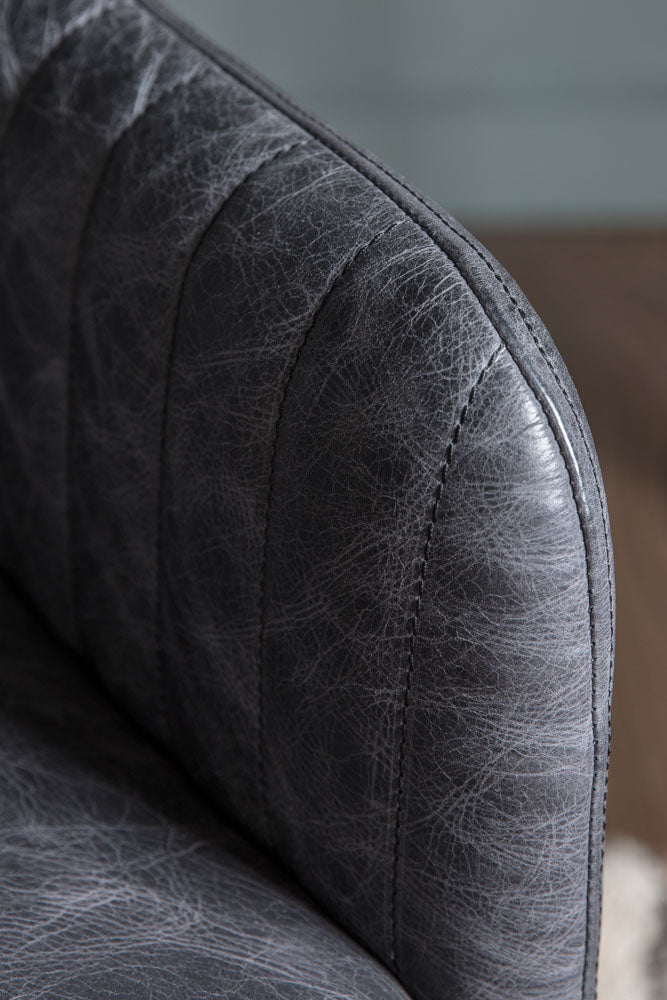 Ribbed Antique-Style Black Leather Swivel Chair