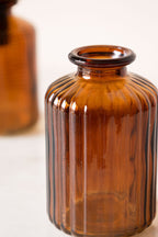 Set of 2 Embossed Glass Bottles in Amber